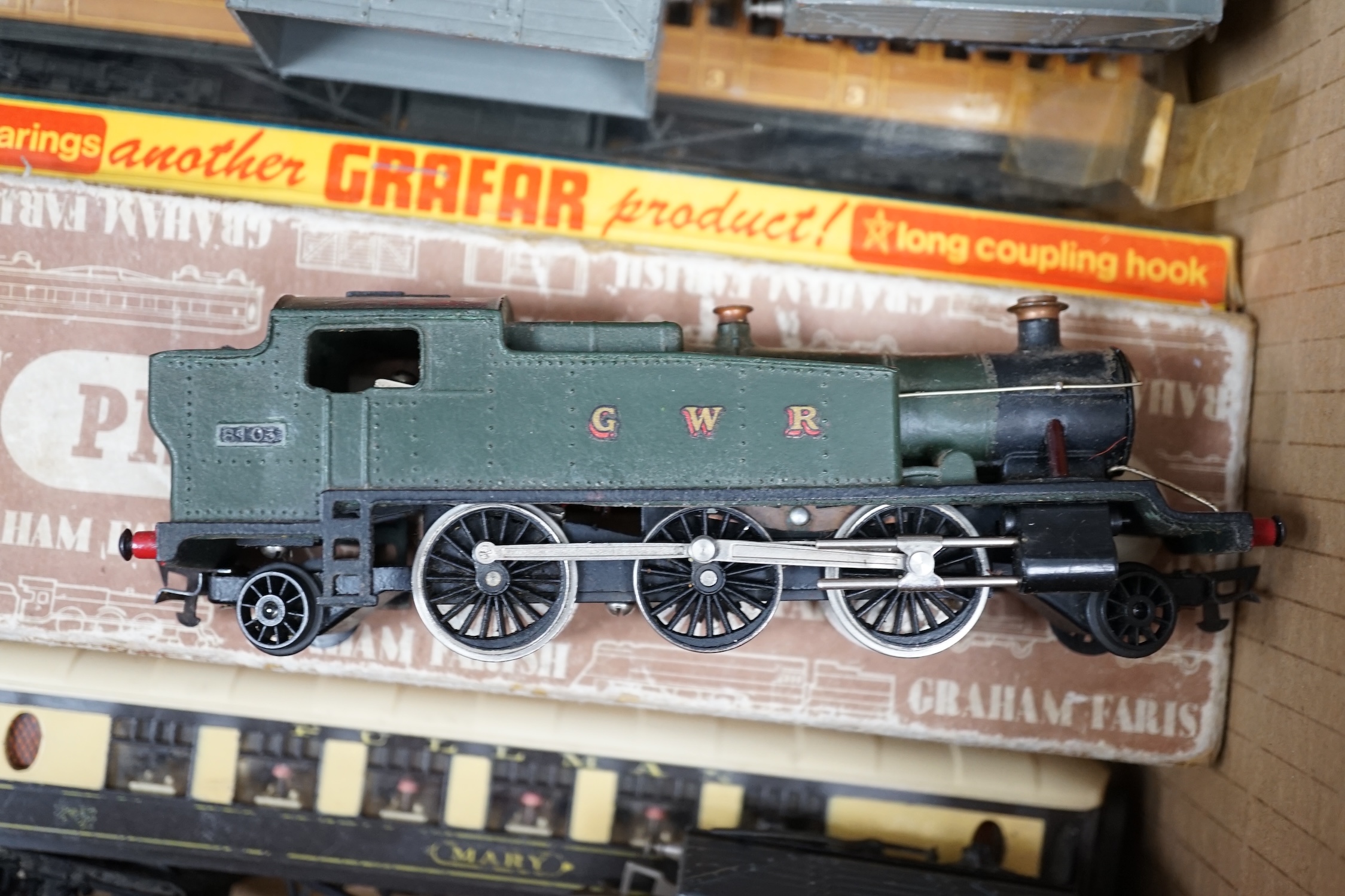 A collection of 00 gauge model Railway by Graham Farish, Exley, etc. including two locomotives; a GWR Prairie Tank loco, plus the remains of another, and a BR Class 5 4-6-0 tender loco, two boxed Pullman cars, freight wa